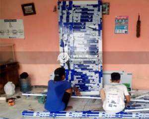 Jasa Pembuatan Pintu Panel Aluminium Alexindo